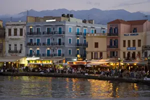 Greek Island of Crete and old town of Chania evening light along the old harbor