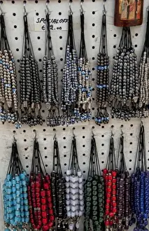 Athens Prints: Greek souvenir beads on rack in downtown shopping area of Plaka, Athens, Greece