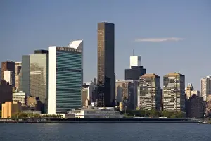 Manhattan Prints: Green fronted United NAtions building and skyscrapers in New York City, New York, USA