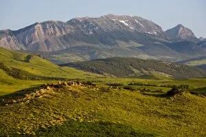 Green grasslands and Choteau Mountain on the Rocky Mountain Front of Montana