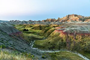 Strip Prints: The green valley with dry creek is fed by the run off of the hoodoos lining the side