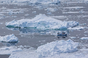 Images Dated 28th May 2015: Greenland, Disko Bay, Ilulissat, elevated view of floating ice and fishing boat