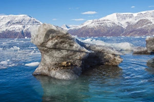 Greenland. Scoresby Sund. Gasefjord. Krogen. Dirty iceberg from the bottom of a glacier