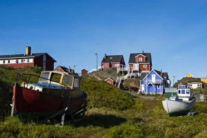 Greenland. Sisimiut. Fishing boats and colorful houses