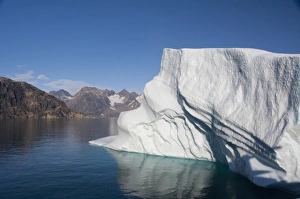 Images Dated 11th September 2010: Greenland, Southeast coast, Skjoldungen Fjord. Large iceberg in scenic fjord surrounded