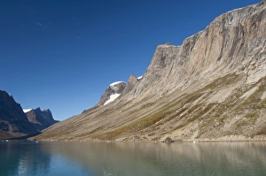 Images Dated 11th September 2010: Greenland, Southeast coast, Skjoldungen Fjord. Deep cliffs carved by ancient glacier