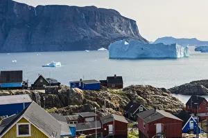 Iceberg Prints: Greenland. Uummannaq. Colorful houses dot the rocky landscape