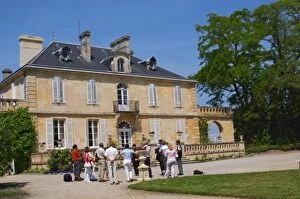 Images Dated 26th May 2005: A group of visiting wine tasters in the garden in front of the chateau Chateau Kirwan