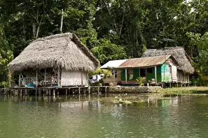 Mayan Prints: Guatemala, Lake Izabal. Indigenous people dwelling on Lake Izabal (Lago de Izabal)
