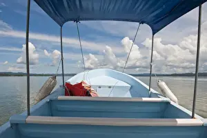 Mayan Prints: Guatemala, Lake Izabal. Speed boat water taxi on Lake Izabal (Lago de Izabal), Guatemala