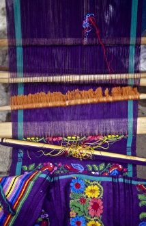Guatemala: San Antonio, weaving on backstrap loom, July