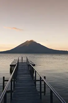 Images Dated 30th October 2010: Guatemala, San Juan la Laguna. Toliman volcano and Lago de Atitlan (Lake Atitlan)