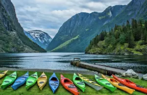 Gudvangen Norway fabulous fjord called Naeroyforden Fjord with colorful kayaks in water