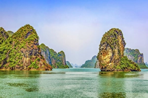 Turquoise Prints: Ha Long Bay, Vietnam. Landscape view of limestone karsts and islets of the UNESCO Heritage Site