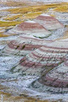 Strip Prints: A half circle of rounded mounds or hoodoo, sharply striated with reds