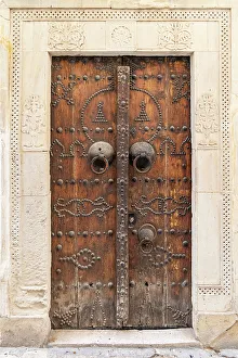 Hammamet Prints: Hammamet, Nabeul, Tunisia. A decorated wooden door on a building