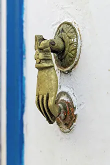 Tunisia Prints: Hammamet, Nabeul, Tunisia. Hand shaped brass door knocker