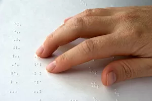 Images Dated 17th October 2007: Hand reading braille