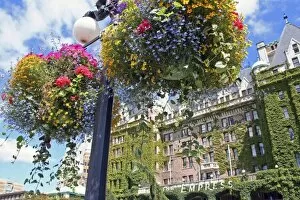 Hanging flowers lamppost Empress Hotel Victoria British Columbia Canada