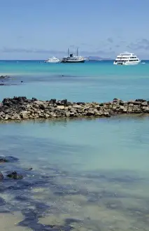 Images Dated 2027: Harbor with blue water and boats and sun Santa Cruz Galapagos Islands Ecuador South