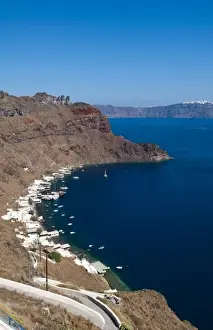 Harbor with boats in isolated village of Thirassia across from Santorini Greece in