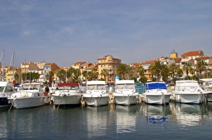 Images Dated 26th March 2006: The harbour with boats and buildings along the water in Bandol. White motor yachts