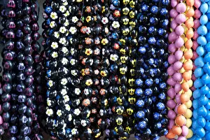Hawaiian lei or necklaces display at market place