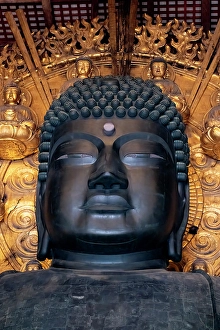 Buddhist Prints: Head of large bronze Buddha, Great Buddha Hall, Todai-ji temple, Nara, Japan