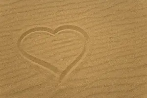 Heart outline drawn in sand. Credit as: Don Paulson / Jaynes Gallery / DanitaDelimont