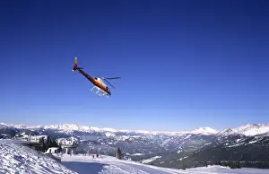 Skiing Prints: Helicopter skiing at famous ski town of Whistler in British Columbia Canada