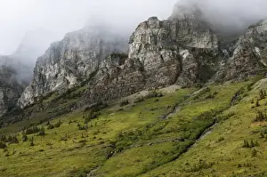 Land Prints: High peaks enclosed in clouds, Waterton Glacier International Peace Park, USA - Canada