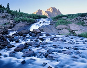 High Uintas Wilderness, Utah. USA. Red Castle Peak rises above falls along East Fork