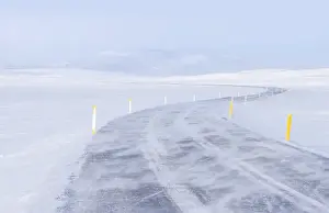 Lonely Prints: The Highland of Iceland close to the ring road during winter in stormy and sunny weather conditions