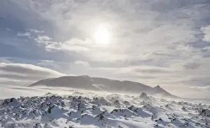 The Highland of Iceland close to the ring road during winter in stormy and sunny weather conditions