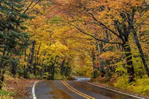 Highway 41 covered roadway in autumn near Copper Harbor in the Upper Peninsula of Michigan