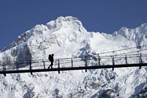 Images Dated 3rd October 2010: Hiker on Hooker River Footbridge & Mt Sefton, Aoraki / Mt Cook National Park, Canterbury