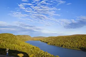 Silver City Prints: Hiker takes in the view at the Lake of the Clouds in Porcupine Mountains State Park