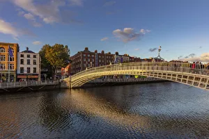 Irish Prints: Historic Ha penny walking bridge over the River Liffey in Dublin, Ireland