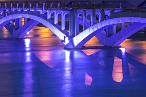 Traffic Prints: Historic Ninth Street Bridge glows at dusk on the Missouri River in Great Falls, Montana
