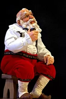 Holiday still life. Simpich Caracter doll, thinking Santa with pipe. Property released