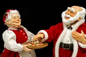 Images Dated 17th December 2006: Holiday still life. Simpich Caracter Doll, Mr. & Mrs. Claus with cookie tray. Property released