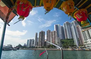Images Dated 2029: Hong Kong China Aberdeen from boat in water of reclaimed land with sktscraper condos