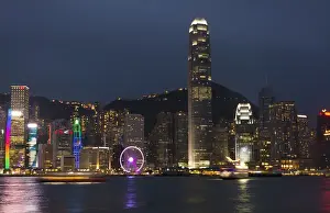 Images Dated 2029 October: Hong Kong China skyline harbour night with new Ferris Wheel in city skyscrapers