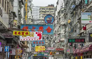 Images Dated 2029: Hong Kong China traffic Kowloon Woosung Street with signs overhanging street
