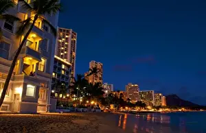 Images Dated 2027: Honolulu, Oahu, Hawaii. Night exposure of Waikiki Beach with Diamond Head in background
