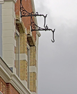 Images Dated 6th September 2007: Hooks hanging from brick building in Amsterdam for pully system