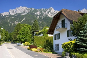 Images Dated 13th June 2006: Housing in Lichtenstein with the Swiss Alps in the background