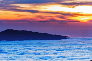 Hualalai Volcano from the summit of Mauna Kea at sunset, Big Island, Hawaii, USA