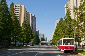 Houses Prints: Huge communist appartment blocks on empty streets, Pyongyang, North Korea