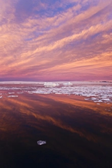 Images Dated 17th August 2011: Huge iceberg and ice floes in the ocean at sunrise, Antarctica